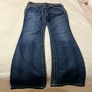 Waist size 29. Regular Ariat boot cut jeans